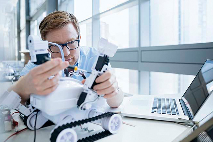 main feature engineer examining robot