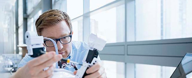 main feature engineer examining robot