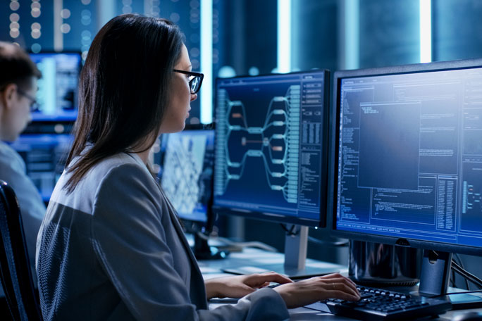 main feature IT Engineer Working in Monitoring Room