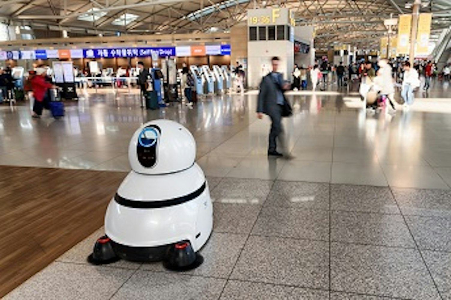 orig disinfecting robot in airport