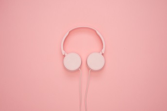 orig headphones on clean pink background