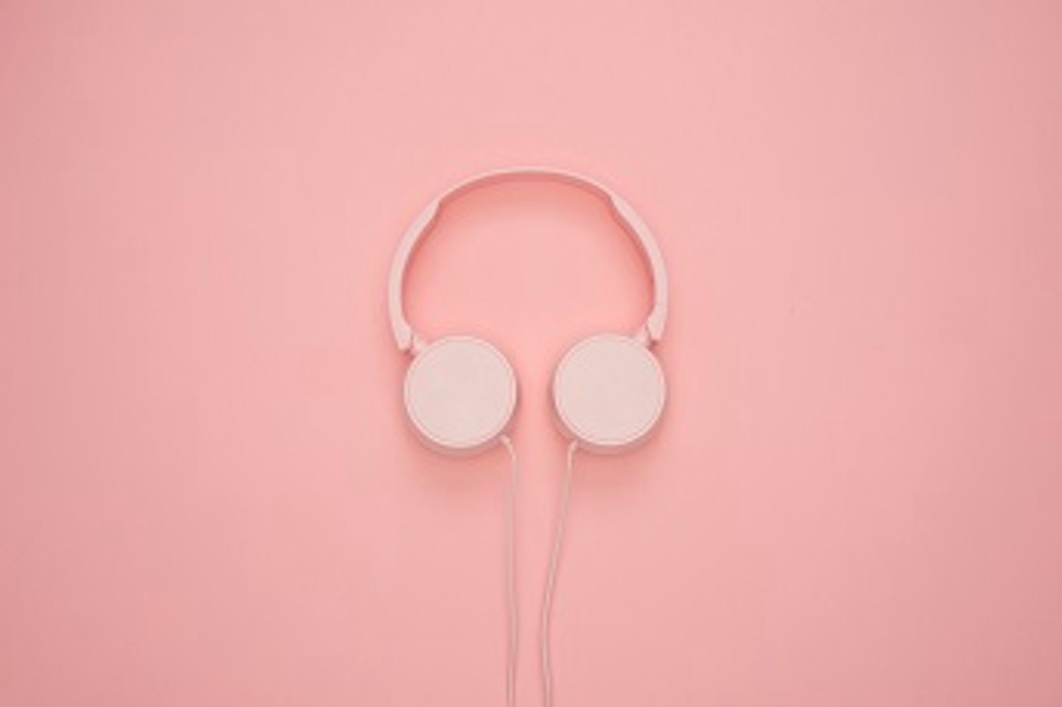 orig headphones on clean pink background