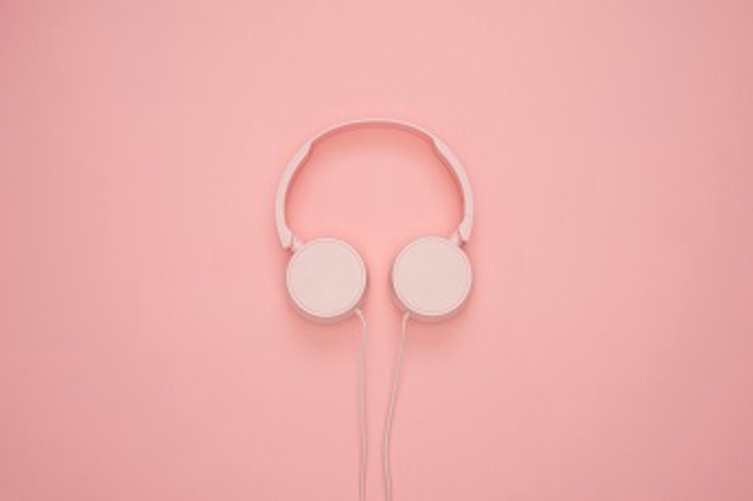 orig headphones on clean pink background