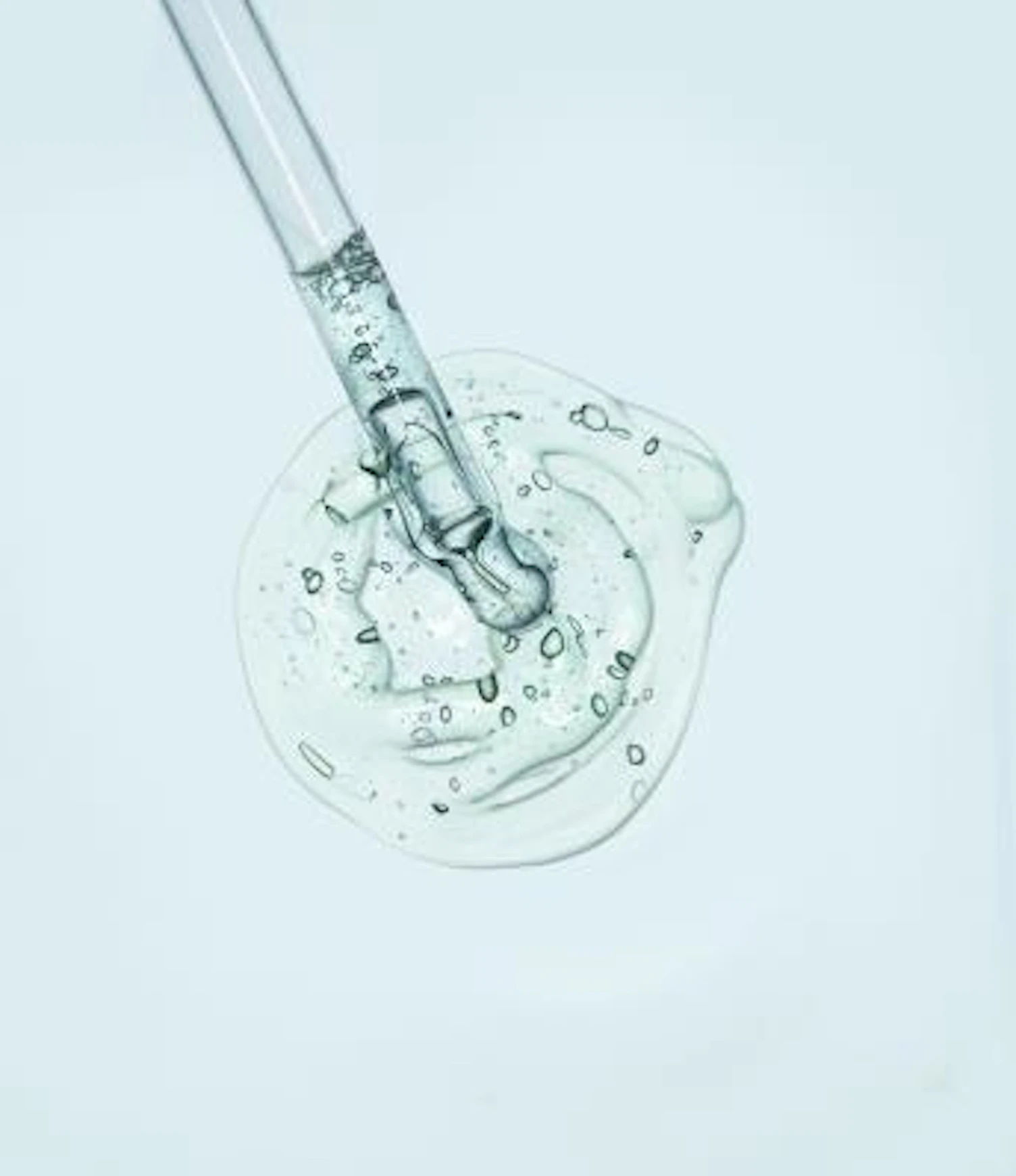 orig iquid serum gel on a table screen of microscope Getty1180257075