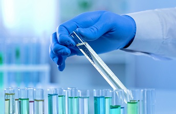 orig lab worker taking test tube scientific experiment