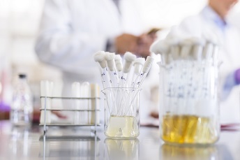 orig test tubes with chemical samples in a jar