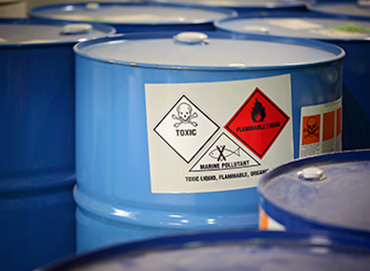 Toxic Substances Labeled in Barrel in a Factory 