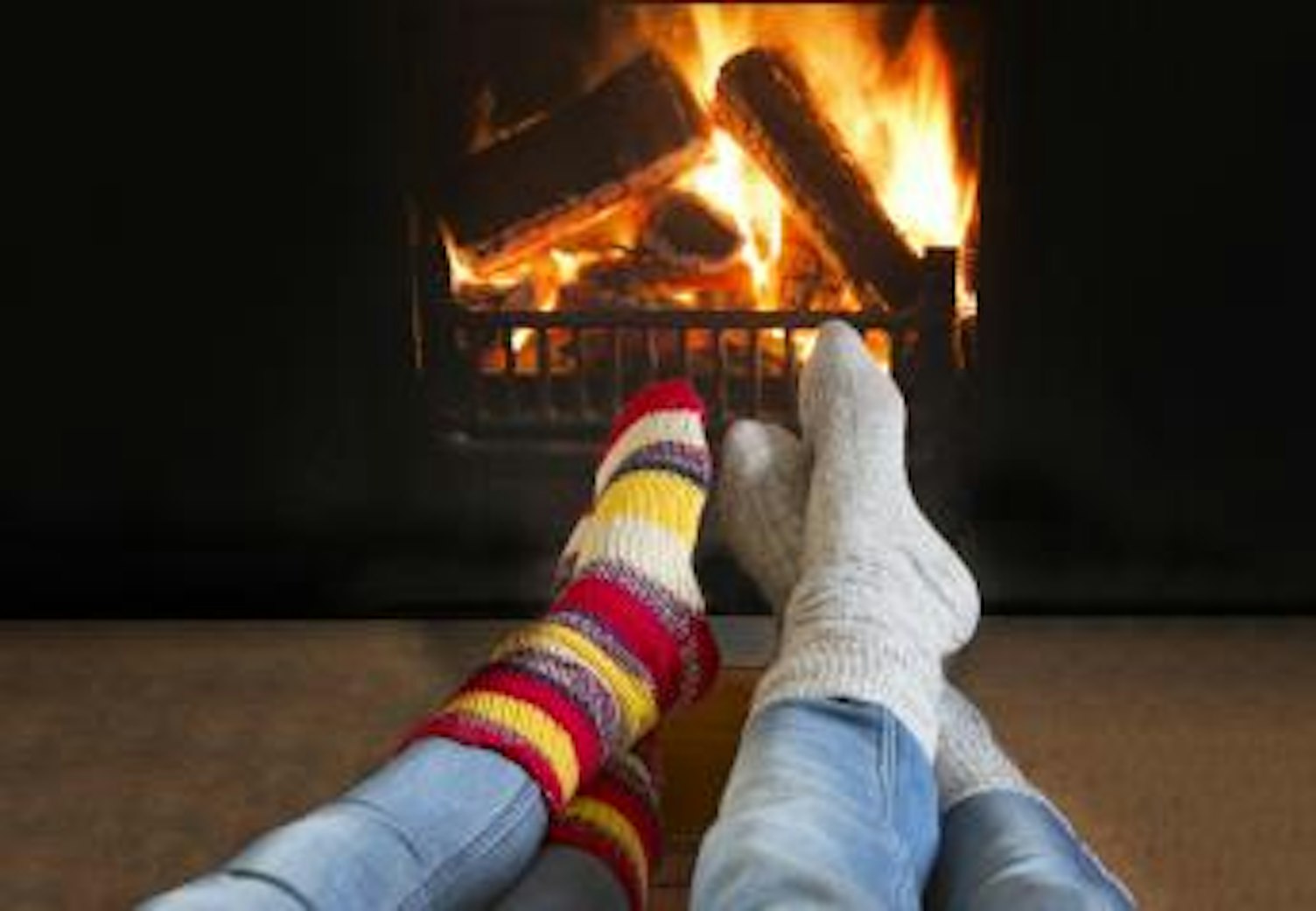 orig warming feet by fire Getty495512709