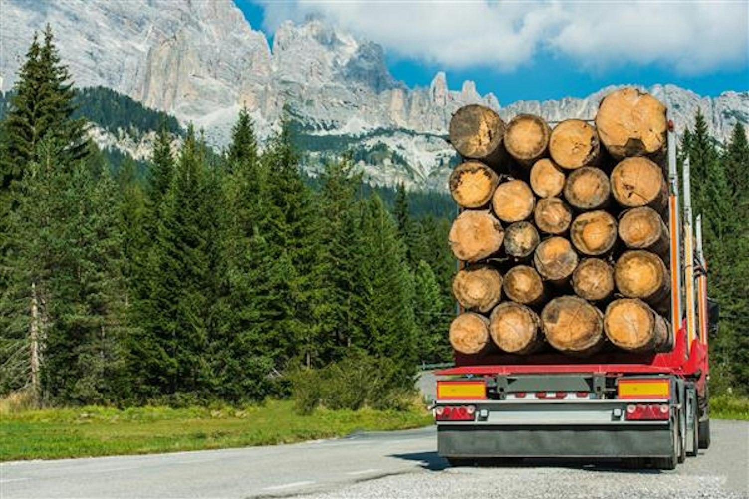 orig wood logs truck delivery