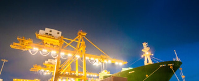 std cargo ship at port dusk