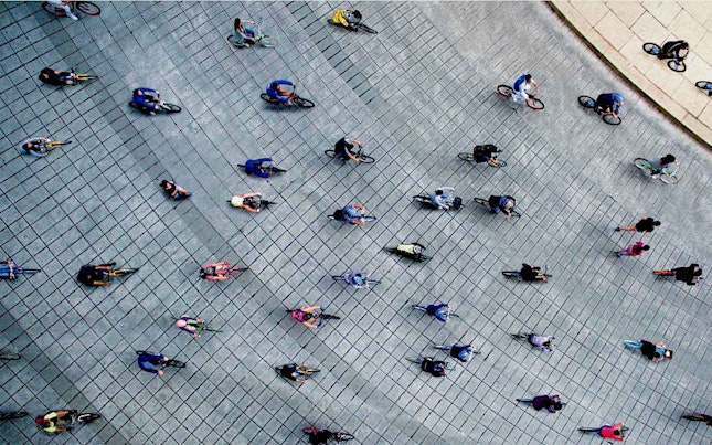 Aerial View of People Riding their Bikes