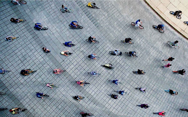Aerial View of People Riding their Bikes