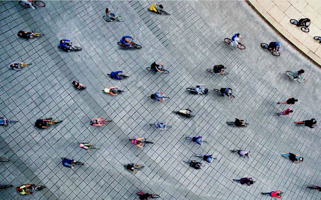 Aerial View of People Riding their Bikes