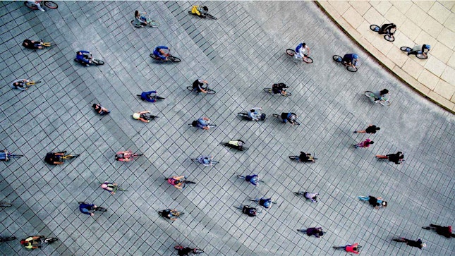 Aerial View of People Riding their Bikes