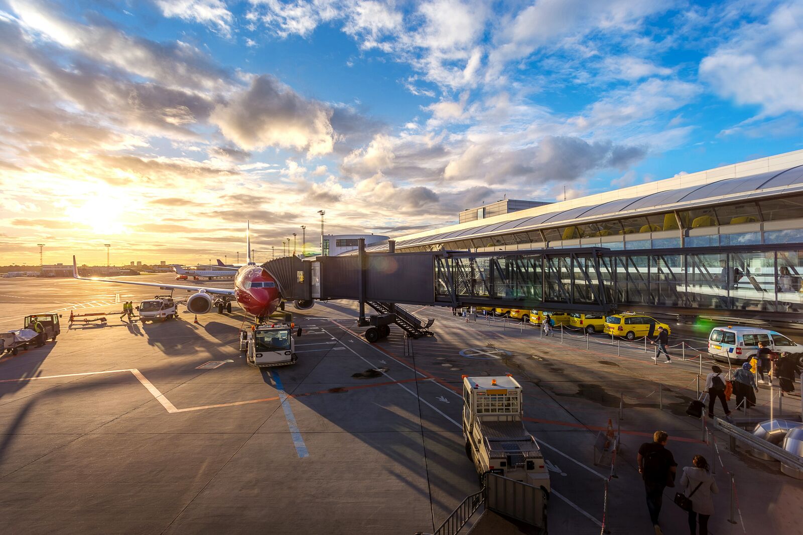 Aircraft on the Tarmac Connected to Jetty