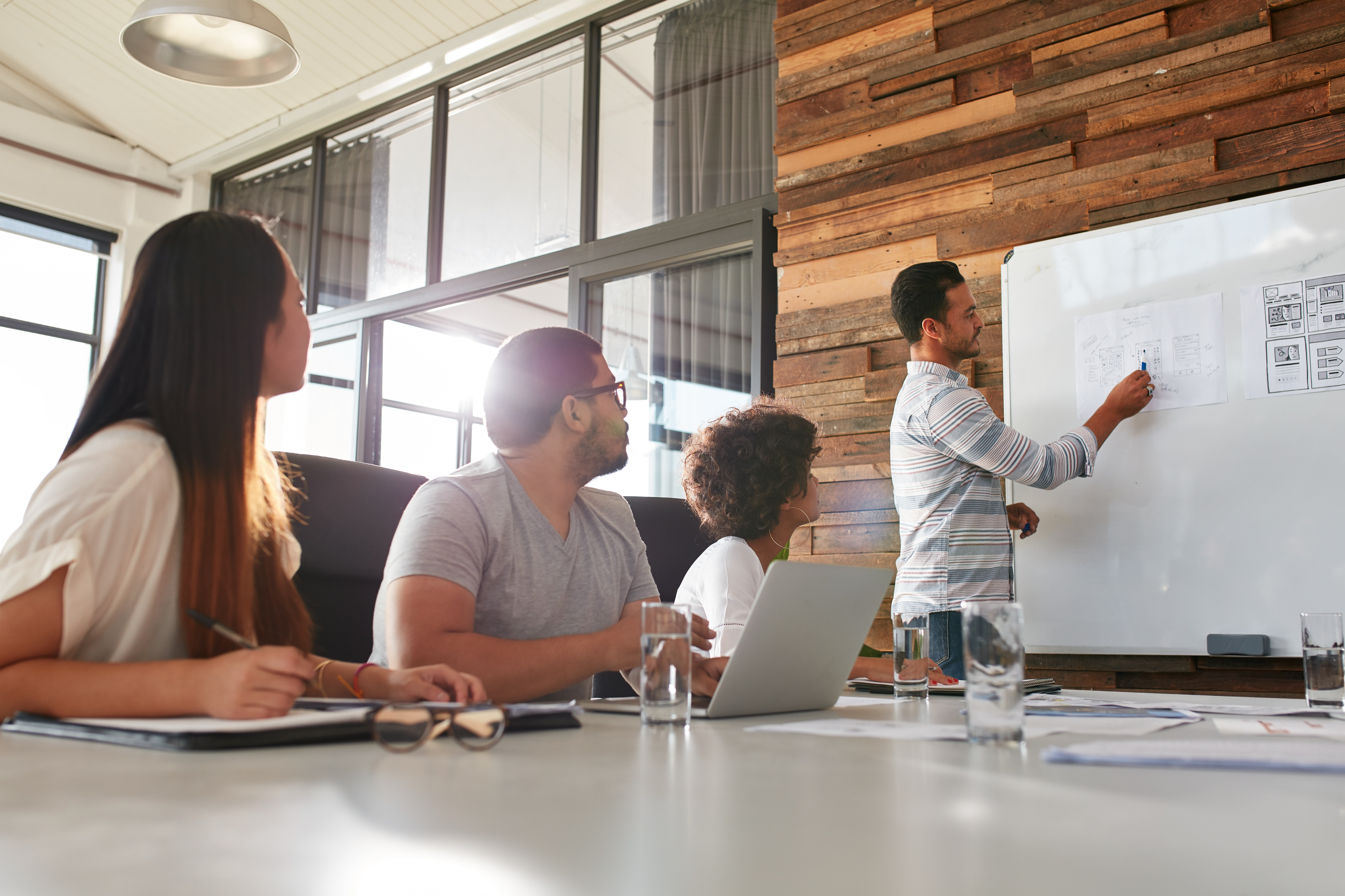 Businessman Giving Training Presentation to his Colleagues