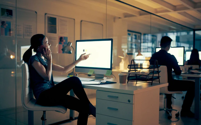 Man Holding External Battery and Smartphone