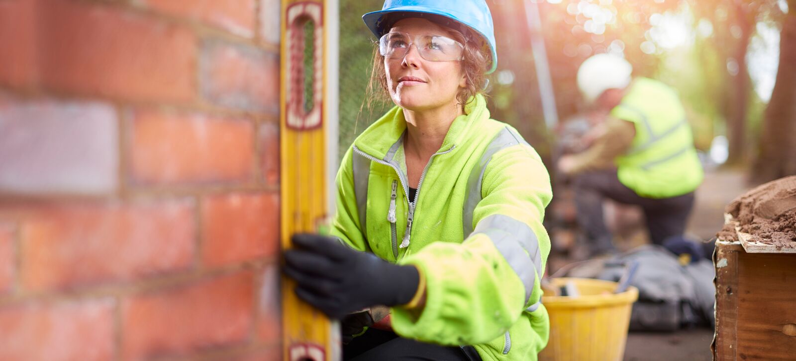 Construction Worker Building a Wall