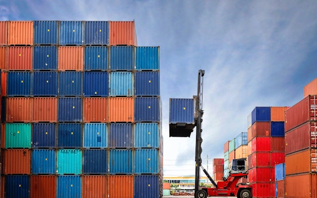 Crane Lifting Up Container