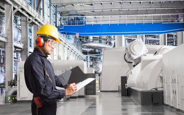 Engineer Inspecting a Thermal Power Plant Factory