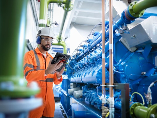 Engineer Working at Power Plant Station