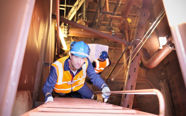Engineer doing an inspection on machinery