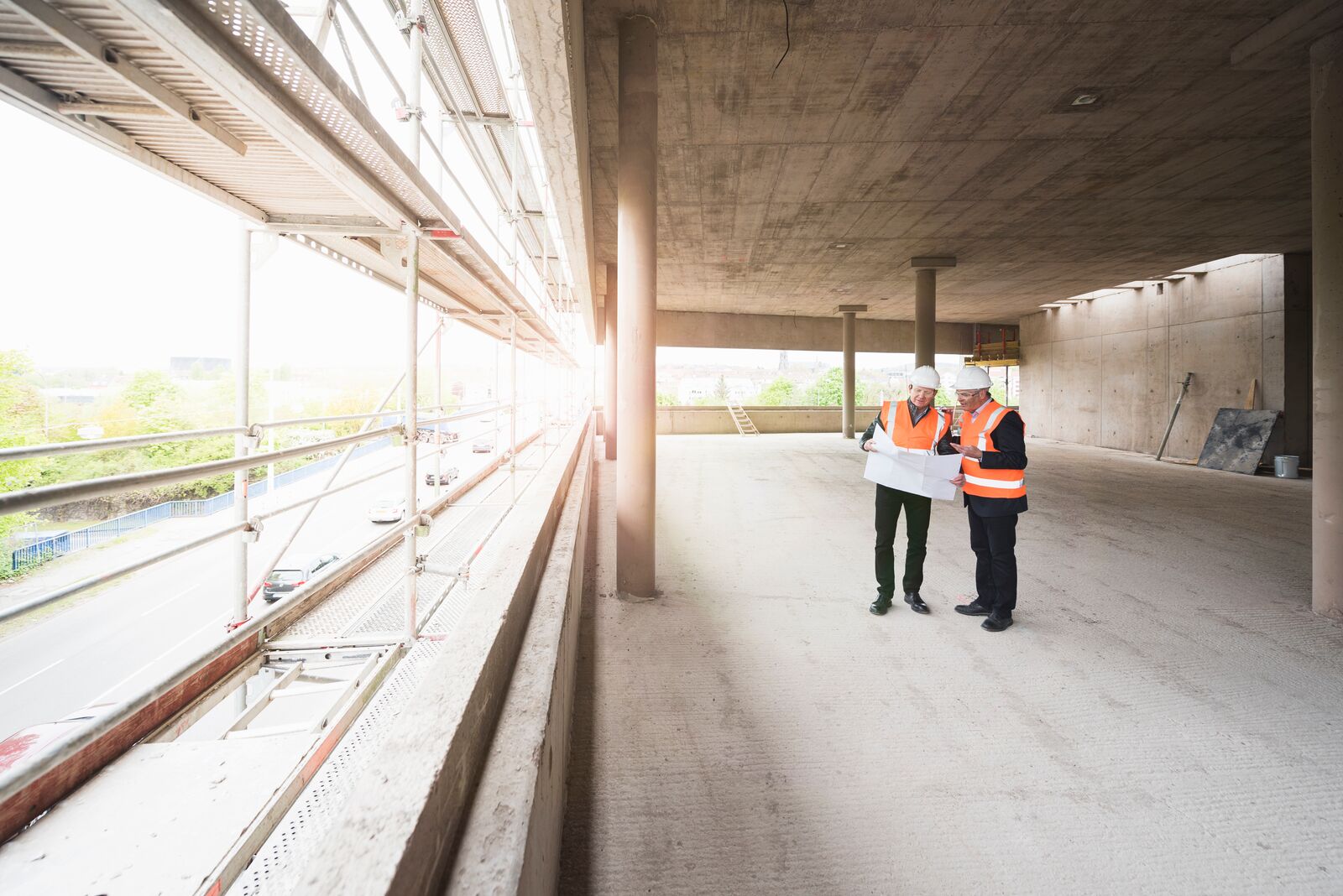 Engineers Checking Construction Plan