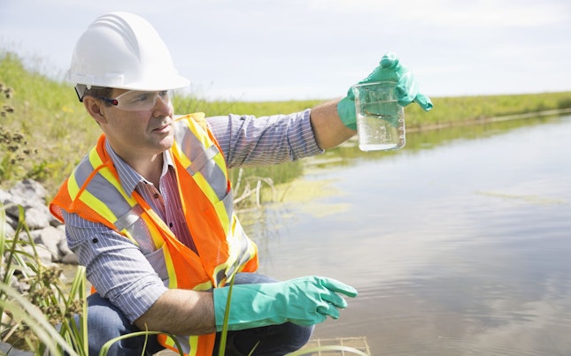 Environmental Scientist Examining Water Sample