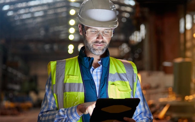 Field worker holding a tablet