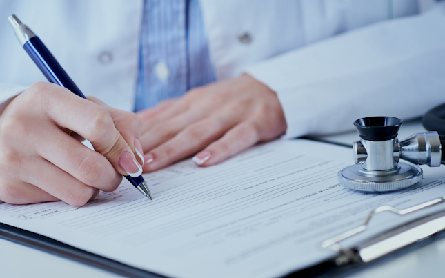 Doctor writing a prescription