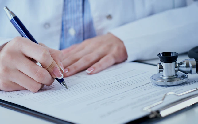 Doctor writing a prescription