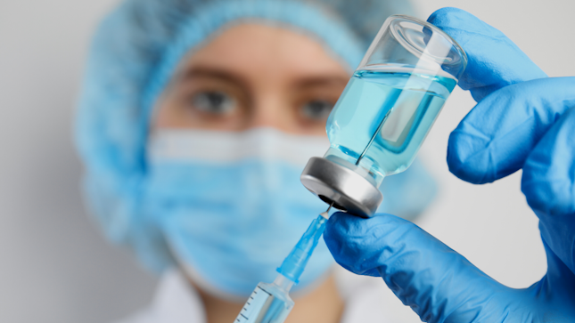 Extracting a vaccine bottle