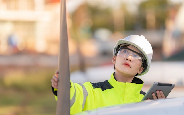 Inspector Auditing the Maintenance of an Aircraft