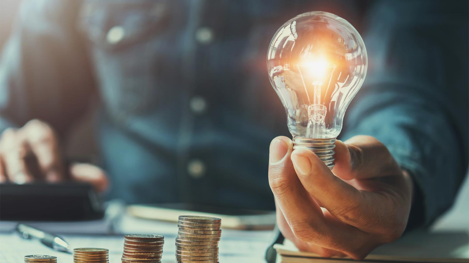 Man holding light bulb