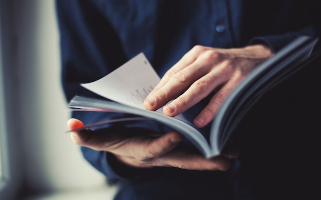 Man reading a magazine