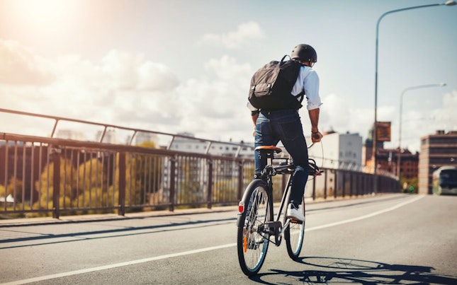 Man Riding Bicycle Commuting to Work