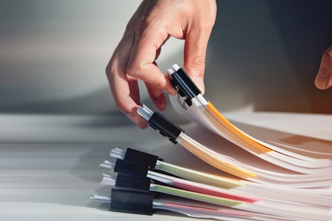 Man Sorting Document Report