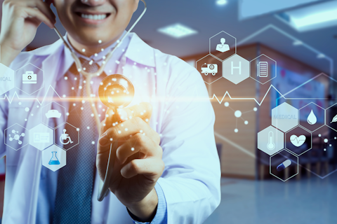 Medicine Doctor and Stethoscope in Hand Touching Icon Medical Network Connection with Modern Virtual