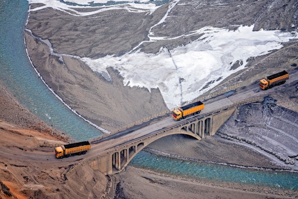 Miner's Truck Rolling on a Bridge