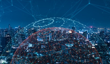 City at night with a wireless network over it