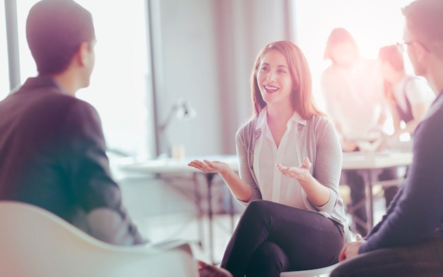 Office Coworkers Talking during a Meeting