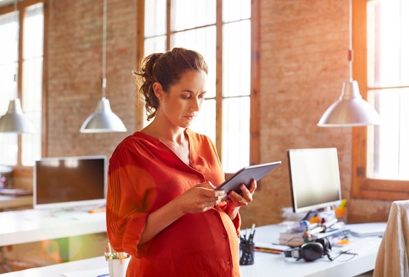 Pregnant Woman Working in an Office