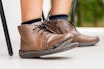 Torn Leather Shoe