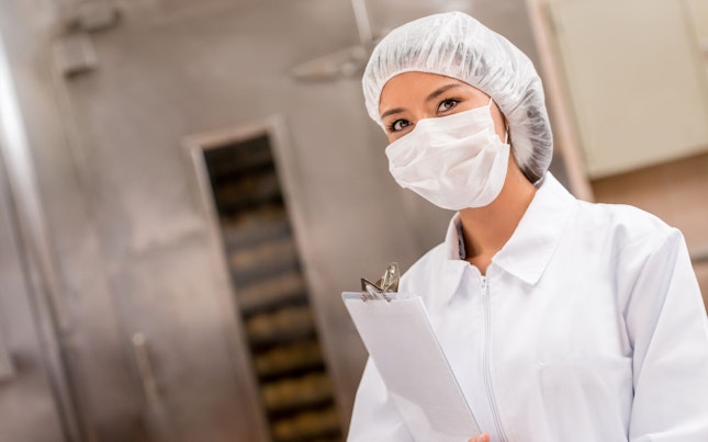 Woman Auditing a Food Factory