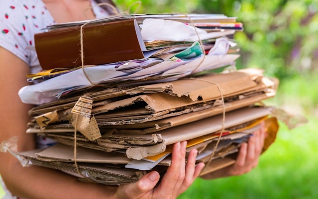 Woman Recycling Paper and Cardboard