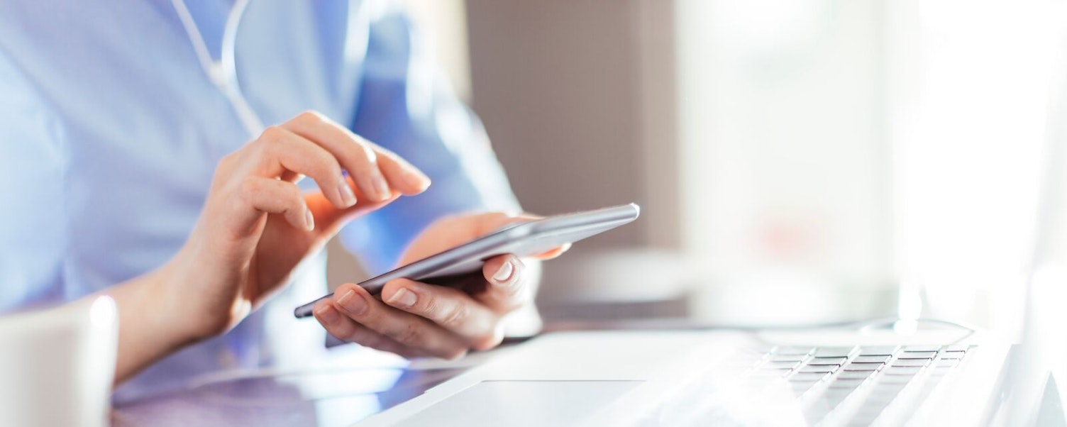 large-Woman Using Smart phone